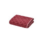 Serviette invitée Néroli en coloris prune, en éponge jacquard ciselée.